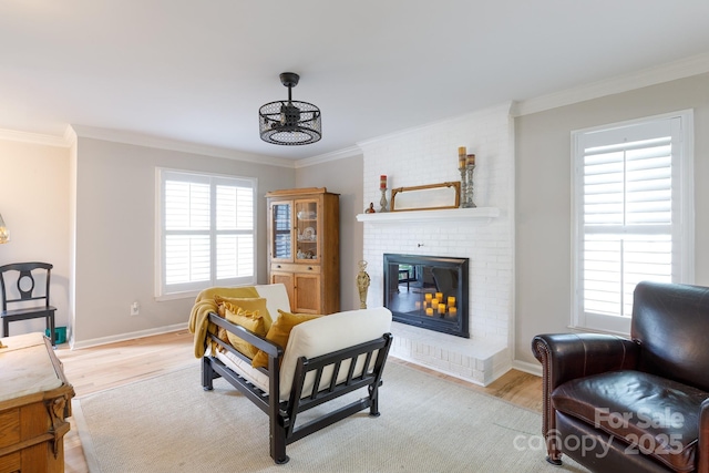 211 Southfork Dr, Belmont, NC 28012 - bedroom featuring ornamental molding, light wood-type flooring, a fireplace, and baseboards