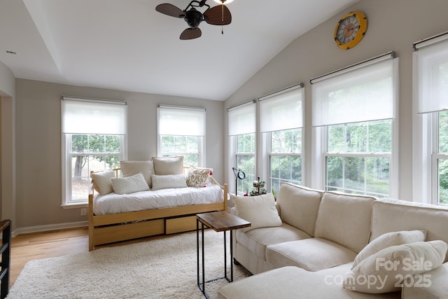 211 Southfork Dr, Belmont, NC 28012 - living room with plenty of natural light, vaulted ceiling, wood finished floors, and a ceiling fan
