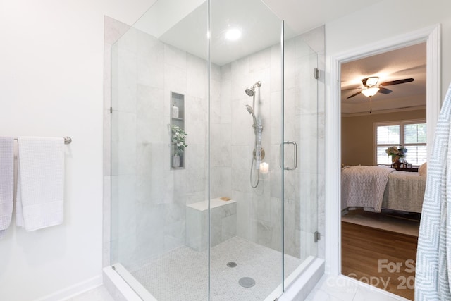 211 Southfork Dr, Belmont, NC 28012 - ensuite bathroom with a stall shower, a ceiling fan, and wood finished floors