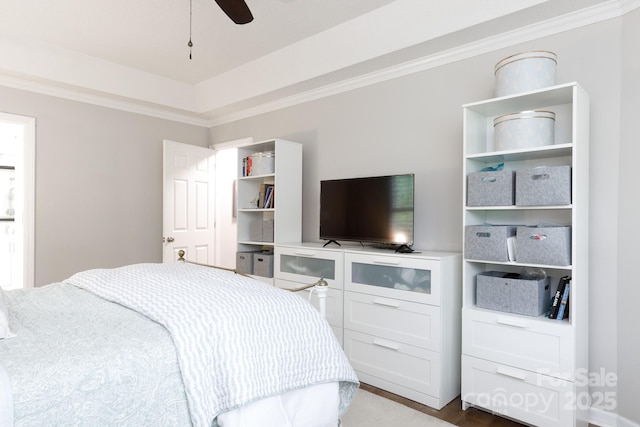 211 Southfork Dr, Belmont, NC 28012 - bedroom featuring crown molding, wood finished floors, a raised ceiling, and a ceiling fan