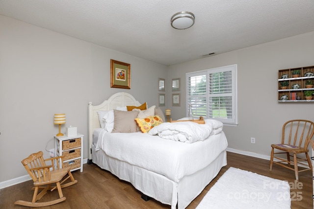 211 Southfork Dr, Belmont, NC 28012 - bedroom with dark wood-style floors and baseboards