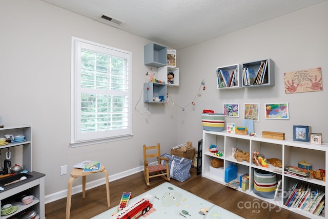 211 Southfork Dr, Belmont, NC 28012 - playroom featuring wood finished floors and baseboards