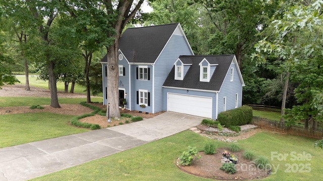 211 Southfork Dr, Belmont, NC 28012 - view of front of home with driveway, a shingled roof, and view of scattered trees