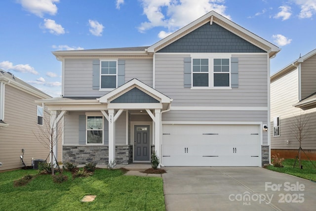 craftsman-style home featuring concrete driveway, stone siding, a garage, cooling unit, and a front yard
