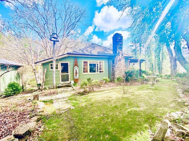 5933 N Norton Rd, Cullowhee, NC 28723 - bungalow-style home with a chimney and a front yard