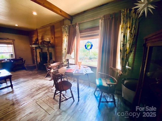 5933 N Norton Rd, Cullowhee, NC 28723 - dining room featuring wood walls, wood finished floors, and beam ceiling