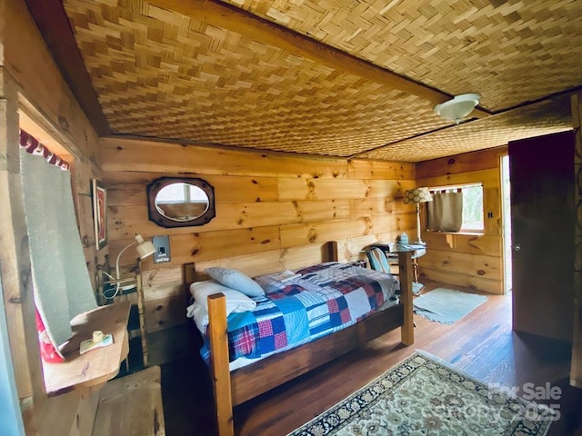 5933 N Norton Rd, Cullowhee, NC 28723 - bedroom featuring wood walls and wood finished floors