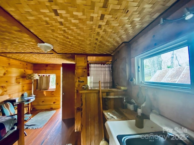 5933 N Norton Rd, Cullowhee, NC 28723 - bedroom with wood finished floors and wood walls