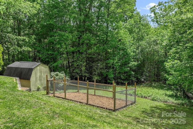 84 Varnadore Dr, Arden, NC 28704 - view of yard featuring a storage shed and a view of trees