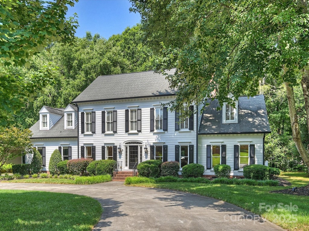5308 Sunningdale Dr, Charlotte, NC 28277 - view of front of home with a front yard and a shingled roof
