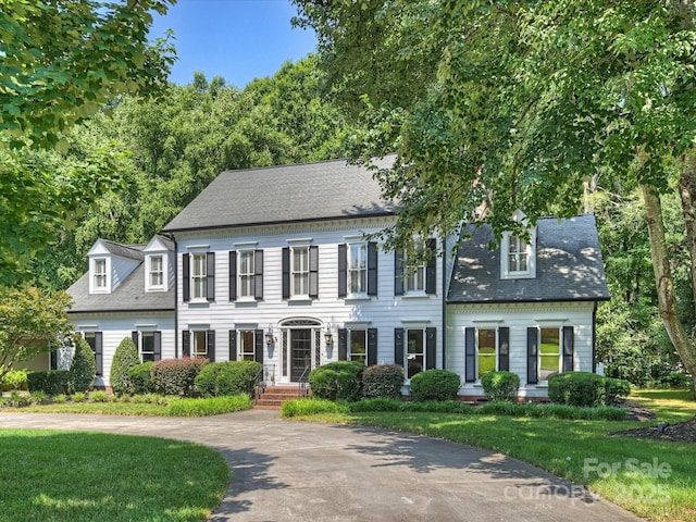 5308 Sunningdale Dr, Charlotte, NC 28277 - view of front of home with a front yard and a shingled roof