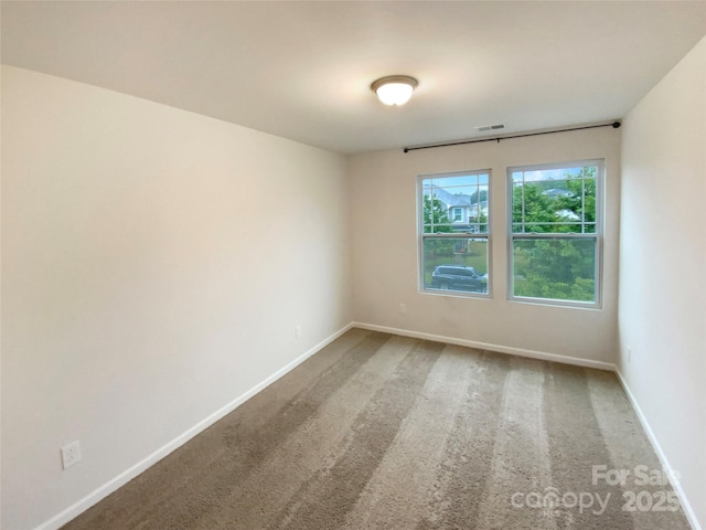 4105 Galloway Park Dr, Charlotte, NC 28262 - unfurnished room with baseboards and carpet floors