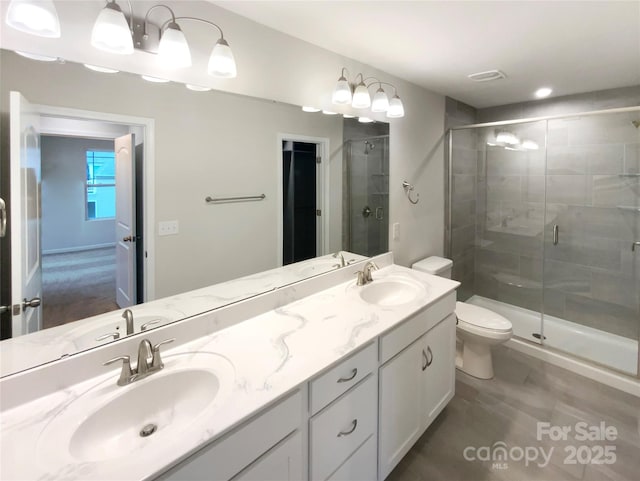 4105 Galloway Park Dr, Charlotte, NC 28262 - full bathroom with a shower stall, double vanity, and toilet