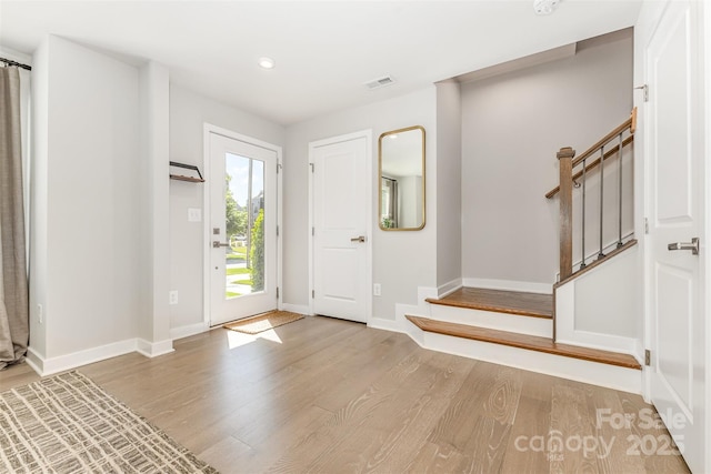 625 Uwharrie River Rd, Charlotte, NC 28211 - entryway featuring wood finished floors, stairway, baseboards, and recessed lighting