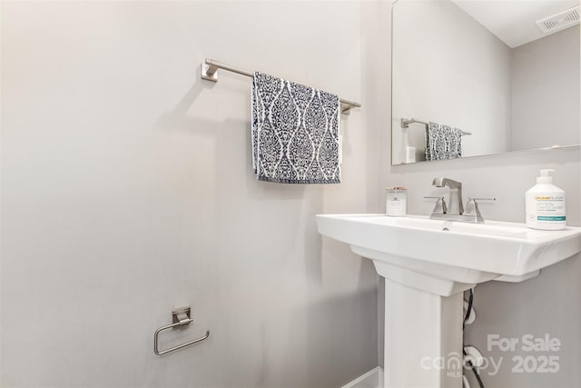 625 Uwharrie River Rd, Charlotte, NC 28211 - bathroom with a sink and baseboards