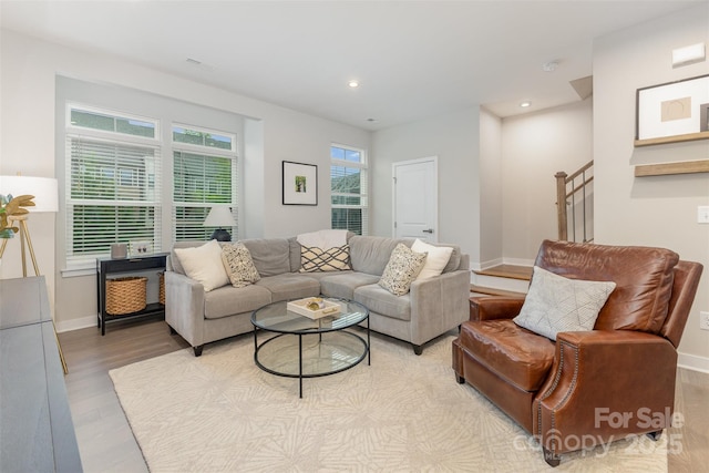 625 Uwharrie River Rd, Charlotte, NC 28211 - living room with light wood-type flooring, stairs, baseboards, and recessed lighting