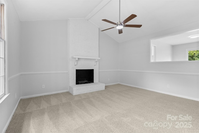 6412 Sullins Rd, Charlotte, NC 28214 - unfurnished living room featuring a ceiling fan, carpet flooring, a brick fireplace, vaulted ceiling, and baseboards