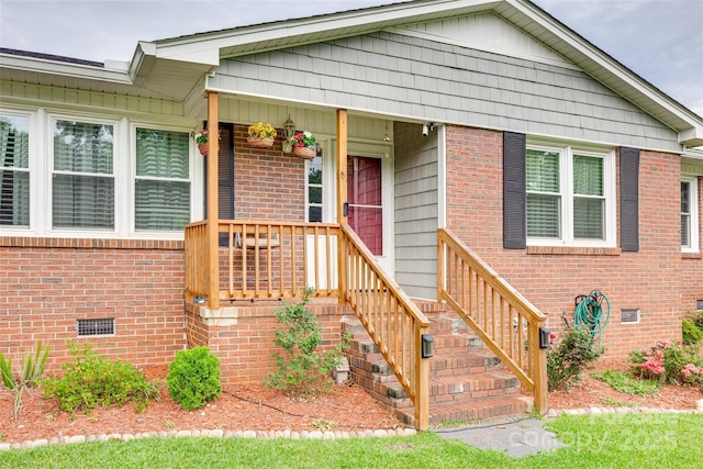 622 University Dr, Rock Hill, SC 29730 - view of front of house featuring crawl space, brick siding, and covered porch