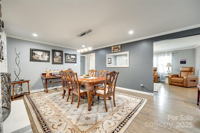 622 University Dr, Rock Hill, SC 29730 - dining room featuring crown molding, light wood-style floors, baseboards, and recessed lighting