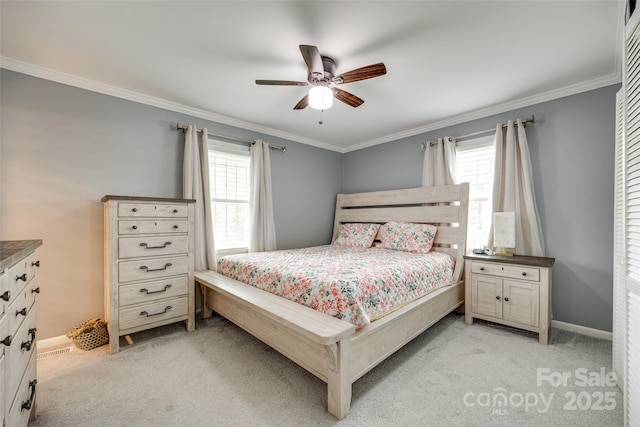 622 University Dr, Rock Hill, SC 29730 - bedroom featuring light carpet, multiple windows, crown molding, and ceiling fan
