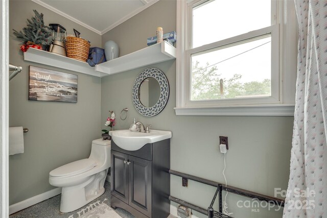 622 University Dr, Rock Hill, SC 29730 - bathroom with ornamental molding, toilet, vanity, and baseboards