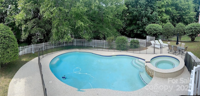 2725 Cotton Planter Ln, Charlotte, NC 28270 - view of pool featuring a patio area and a pool with connected hot tub