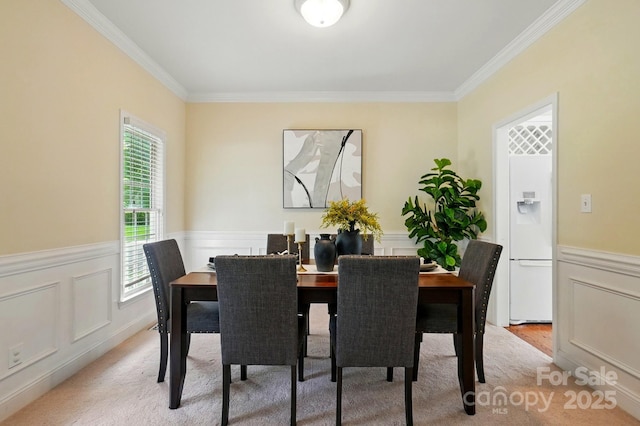 2725 Cotton Planter Ln, Charlotte, NC 28270 - dining space featuring ornamental molding, wainscoting, and a decorative wall