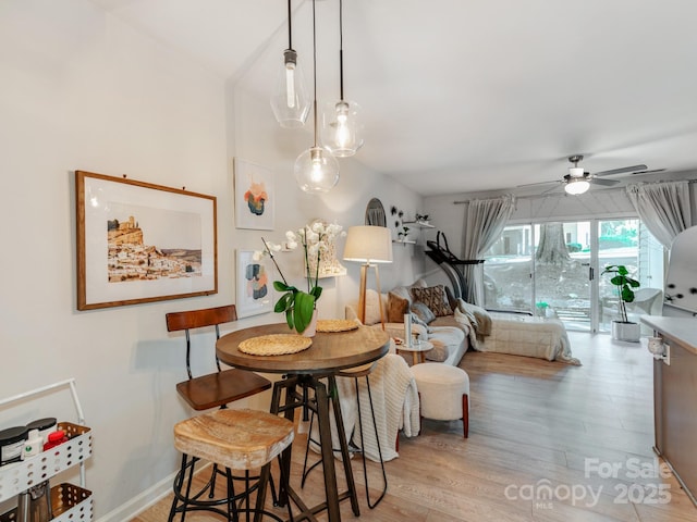 3308 Selwyn Farms Ln Unit 2, Charlotte, NC 28209 - dining space with light wood-style floors and a ceiling fan