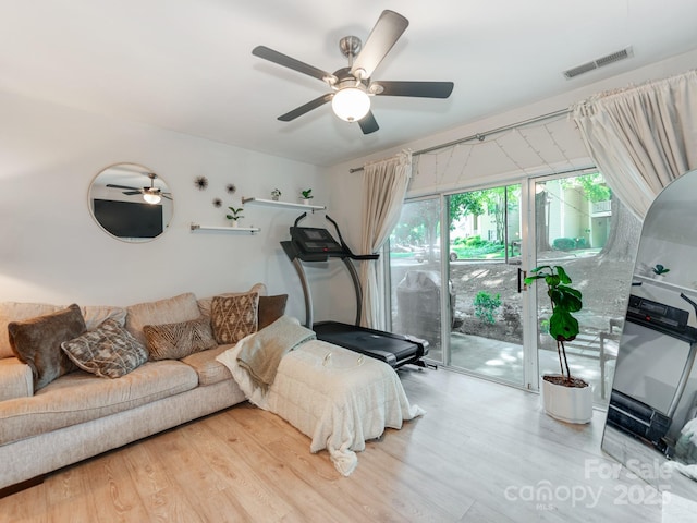 3308 Selwyn Farms Ln Unit 2, Charlotte, NC 28209 - living room featuring ceiling fan and wood finished floors