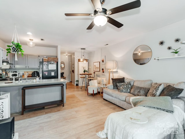 3308 Selwyn Farms Ln Unit 2, Charlotte, NC 28209 - living room with ceiling fan and light wood-type flooring