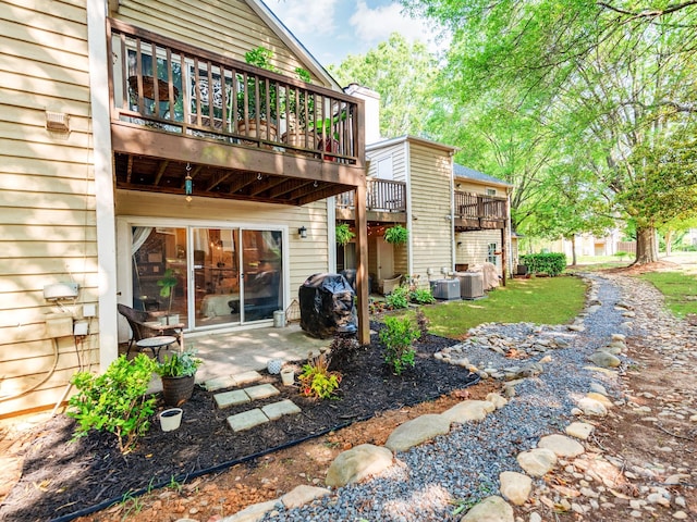 3308 Selwyn Farms Ln Unit 2, Charlotte, NC 28209 - rear view of property with a balcony, cooling unit, and a patio area