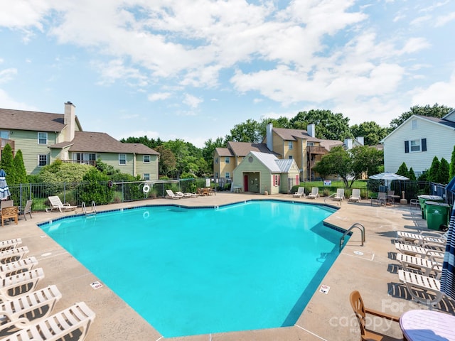 3308 Selwyn Farms Ln Unit 2, Charlotte, NC 28209 - community pool with a patio area and a residential view
