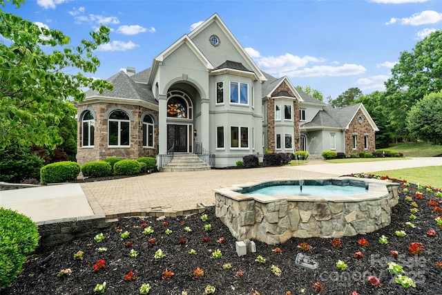 2971 Kaneland Ct, Rock Hill, SC 29732 - rear view of property featuring stone siding and stucco siding