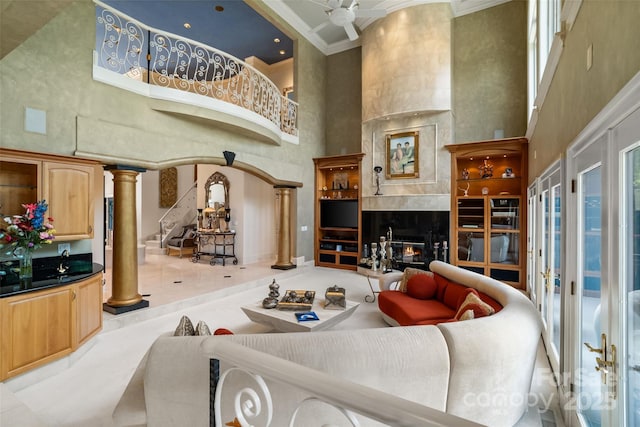 2971 Kaneland Ct, Rock Hill, SC 29732 - living room with a high ceiling, crown molding, a premium fireplace, and stairs