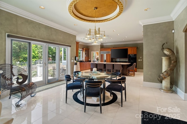 2971 Kaneland Ct, Rock Hill, SC 29732 - dining area featuring a chandelier, crown molding, baseboards, a tray ceiling, and light tile patterned floors