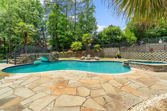 2971 Kaneland Ct, Rock Hill, SC 29732 - view of pool with stairs, a patio area, and a fenced backyard