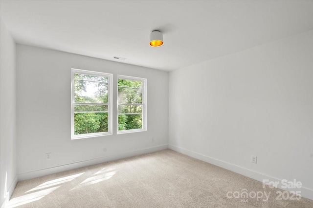 4541 Kings Ct, Hickory, NC 28602 - carpeted spare room with baseboards