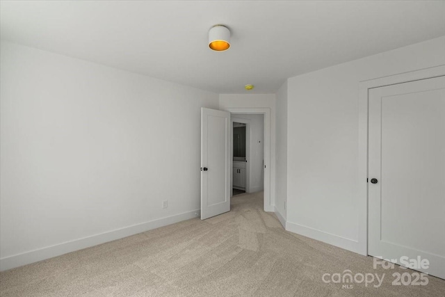 4541 Kings Ct, Hickory, NC 28602 - unfurnished bedroom featuring light colored carpet and baseboards