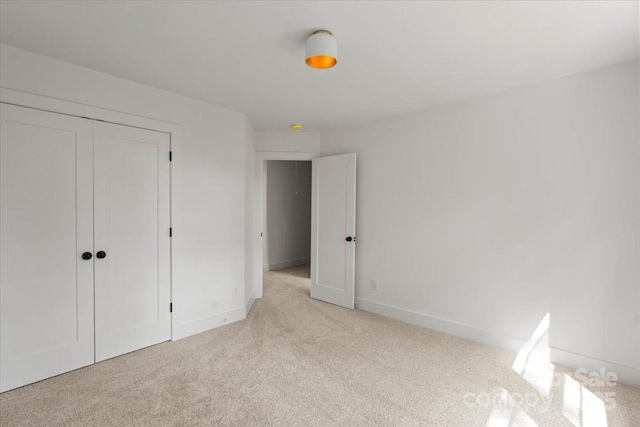 4541 Kings Ct, Hickory, NC 28602 - unfurnished bedroom with carpet flooring, a closet, and baseboards