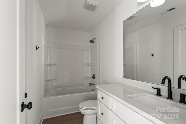 4541 Kings Ct, Hickory, NC 28602 - full bathroom featuring toilet, vanity, wood finished floors, and shower / washtub combination