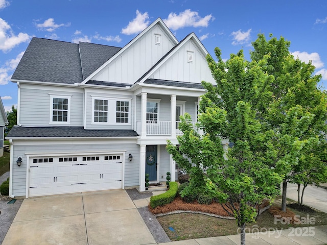 295 Helton Ln, Fort Mill, SC 29708 - view of front of house featuring board and batten siding, a garage, driveway, and roof with shingles
