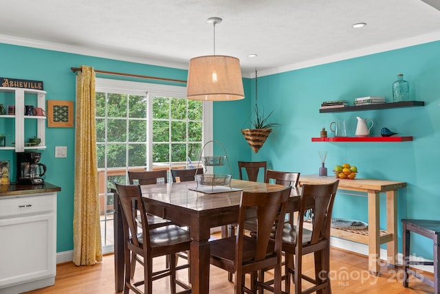 27 Dixon Ter, Candler, NC 28715 - dining room featuring crown molding, light wood finished floors, and recessed lighting