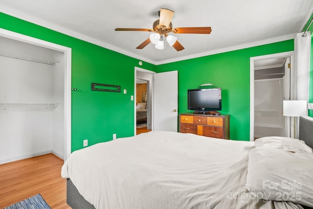 27 Dixon Ter, Candler, NC 28715 - bedroom featuring wood finished floors, ceiling fan, and a closet