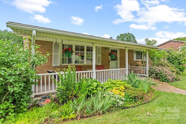 27 Dixon Ter, Candler, NC 28715 - single story home featuring covered porch and brick siding