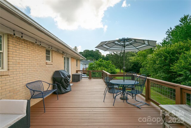 27 Dixon Ter, Candler, NC 28715 - wooden terrace with outdoor dining space and area for grilling