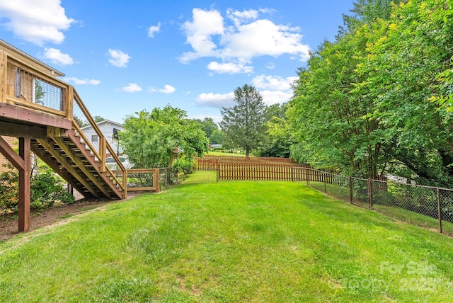 27 Dixon Ter, Candler, NC 28715 - fenced backyard with stairway and a deck