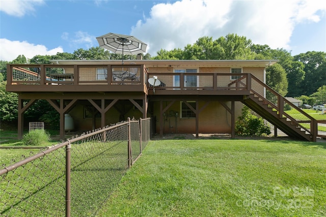 27 Dixon Ter, Candler, NC 28715 - rear view of house with a deck, stairway, and brick siding