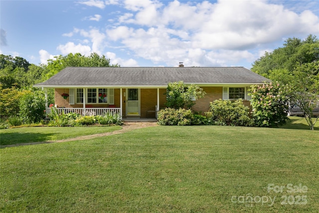 27 Dixon Ter, Candler, NC 28715 - ranch-style house with covered porch, brick siding, and a front yard