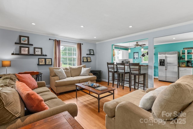 27 Dixon Ter, Candler, NC 28715 - living area featuring crown molding, a ceiling fan, light wood-type flooring, and recessed lighting