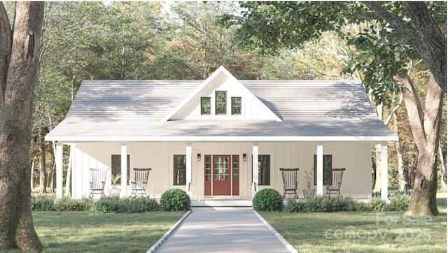 view of front of house featuring a porch and a front lawn